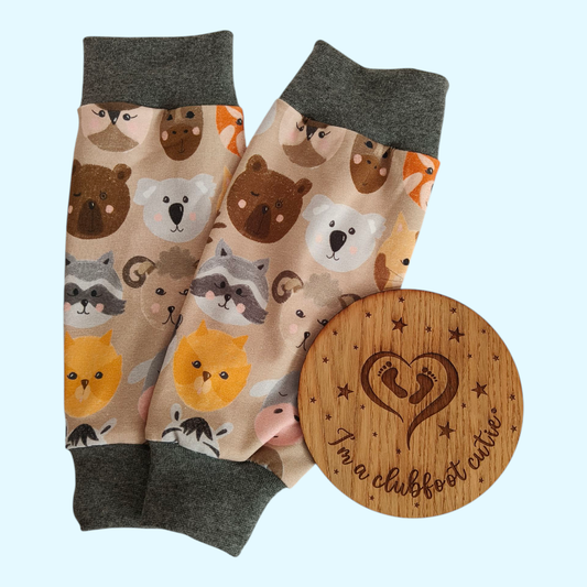 Cast cover leg warmer Autumnal animal heads