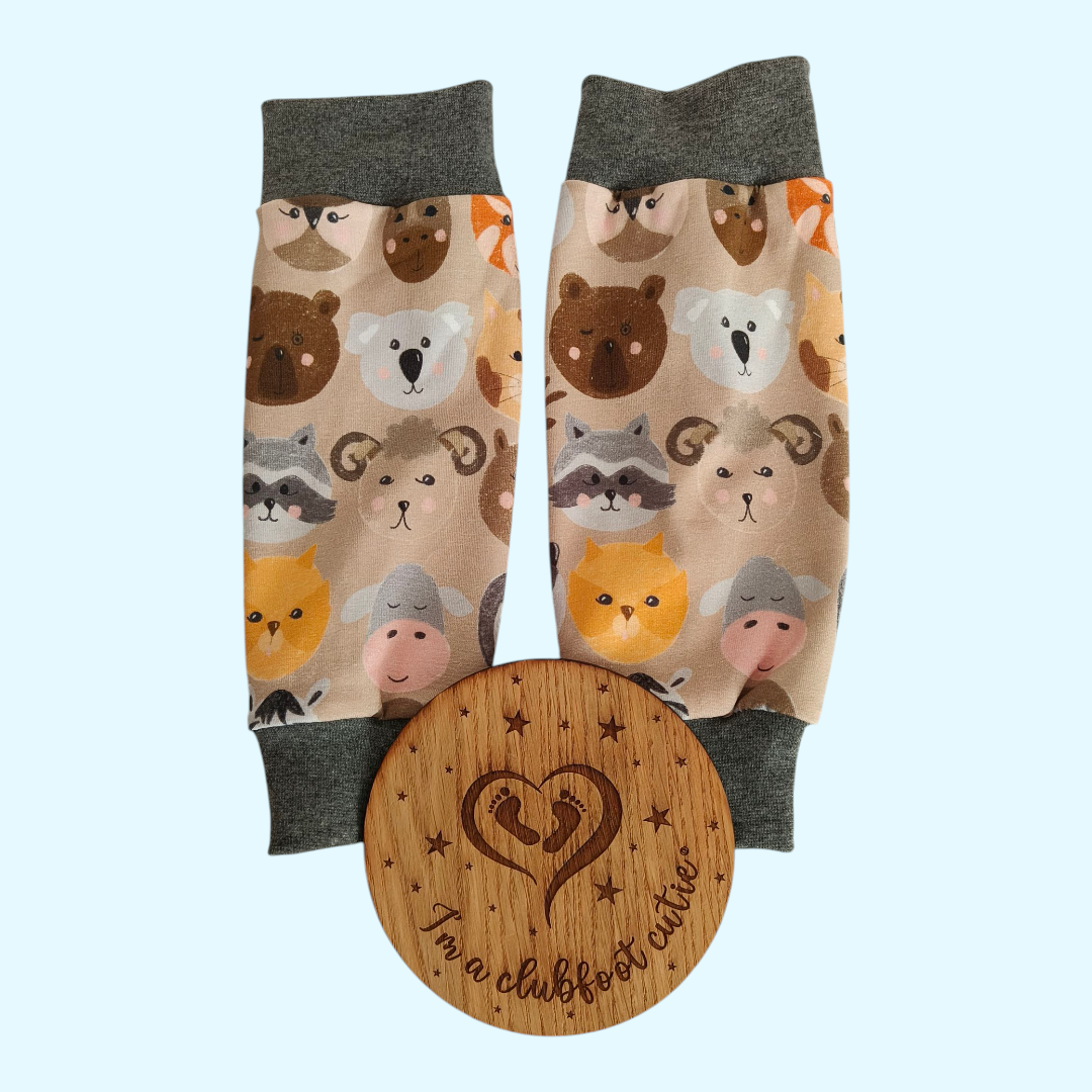 Cast cover leg warmer Autumnal animal heads