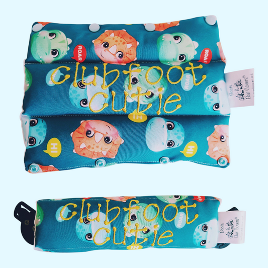 Dino faces soft shell fabric